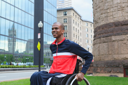 Man in wheelchair who had Spinal Meningitis moving independently in the city