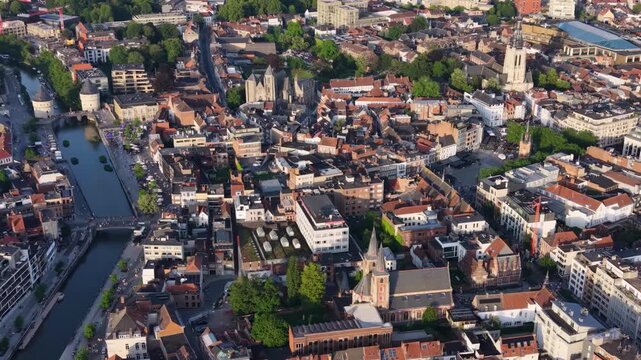 Aerial view beside the old town above the city Kortrijk in Belgium, on a sunny afternoon in early summer.