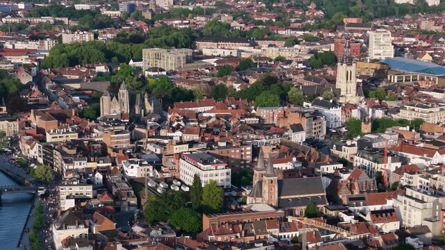 Aerial view beside the old town above the city Kortrijk in Belgium, on a sunny afternoon in early summer.
