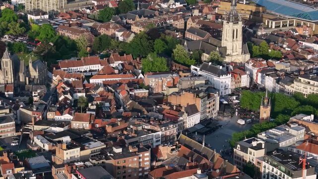 Aerial view beside the old town above the city Kortrijk in Belgium, on a sunny afternoon in early summer.
