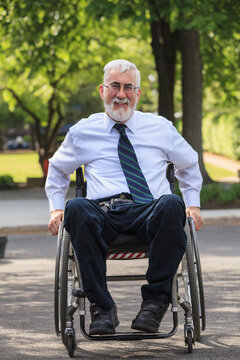 Businessman with Muscular Dystrophy in a wheelchair