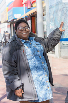 Woman with bipolar disorder studying a subway map