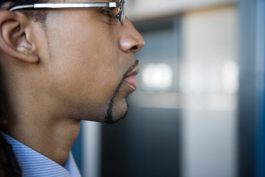 A young Business man wearing glasses