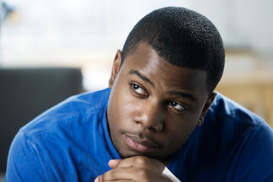 Close up of a depressed young man