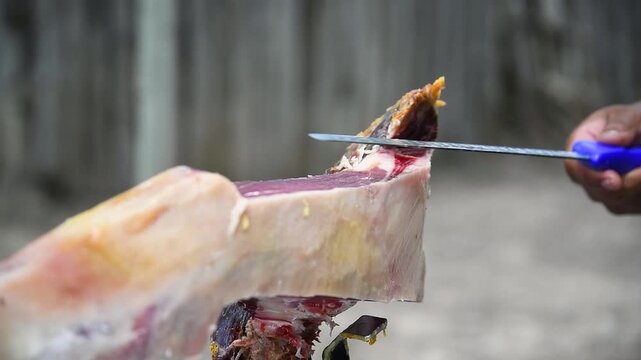 Close Up Scene of Gourmet Spanish Serrano Ham Being Thinly Sliced