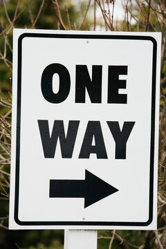 Close up of a one way sign