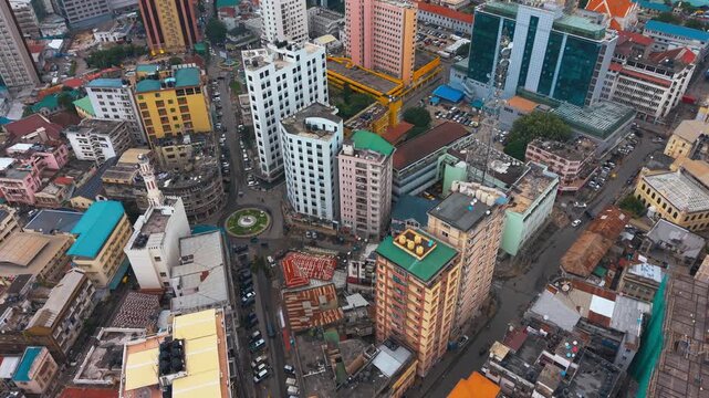 Aerial view of Dar es Salaam showcasing its coastal skyline, urban expansion, and vibrant city structure.