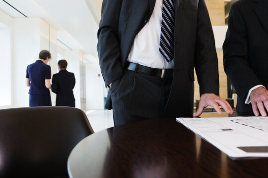 View of businesspeople planning in an office