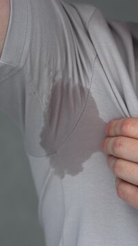 Sweat on clothes.
A sweat stain on a guy's arm on a hot day.