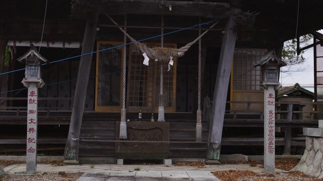 Close-up of a traditional Shinto shrine entrance in Japan.