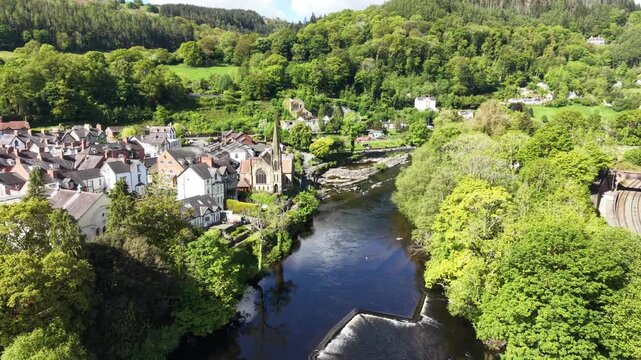 Llangollen Methodist Church North Wales on banks of River Dee drone aerial