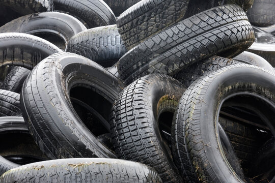 Piles of wet rubber tires