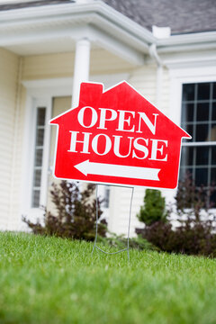 Open House signboard in front of a house