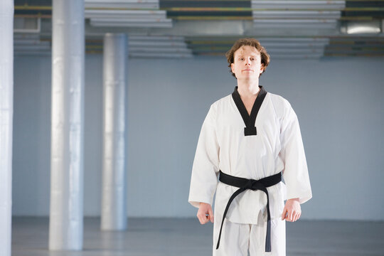 Young man in karate uniform