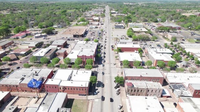 Aerial video of Ennis, Texas Camera is heading southwest from main street down 287 business