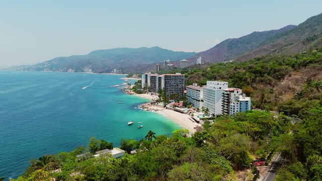 Beautiful drone view of las gemelas and the crystal-clear beaches in Puerto Vallarta, Jalisco