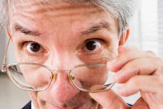 Close up of a business man staring