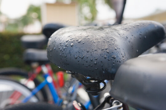 Close-up of water drops on a bicycle seat