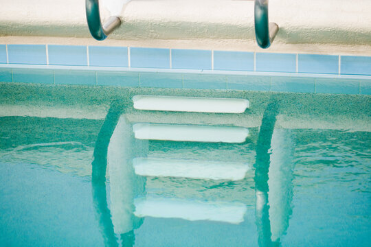 Reflection of steps in a swimming pool