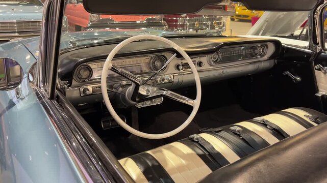 Step inside a world of nostalgia, where glossy finishes and elegant designs come alive. Experience the beauty of classic car interiors showcasing timeless craftsmanship