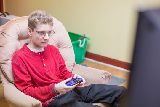 Boy with Anxiety Disorder playing video games