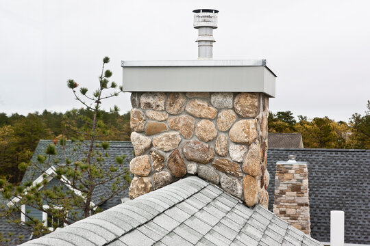 Light reflective roof and energy efficient chimney of a Green Technology Home