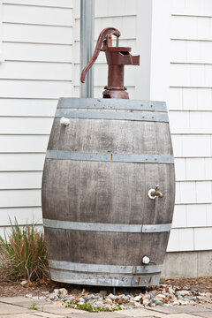 Rain barrel at a Green Technology Home for rainwater harvesting and reuse