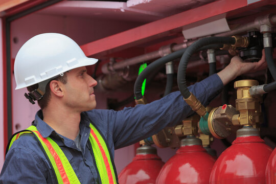 Industrial engineer checking gas valves at a power plant