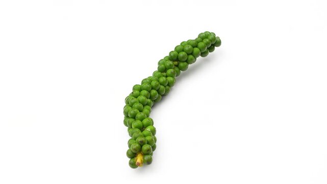 Close-up of a fresh green peppercorn bunch rotating slowly isolated on a pure white background, premium spice.