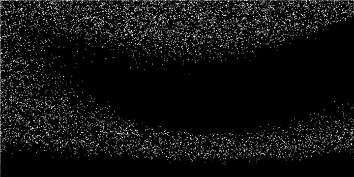 Flying dust particles on a black background
