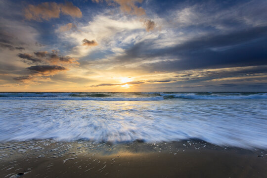 Sunrise over ocean at Crescent Beach on Block Island