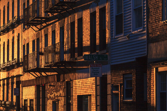 Light reflecting off buildings in North End