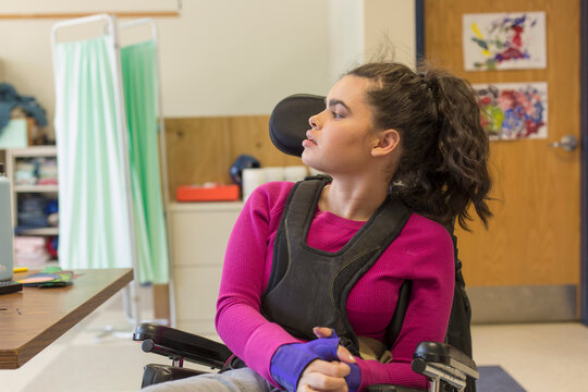 Girl with Tuberous Sclerosis learning at school