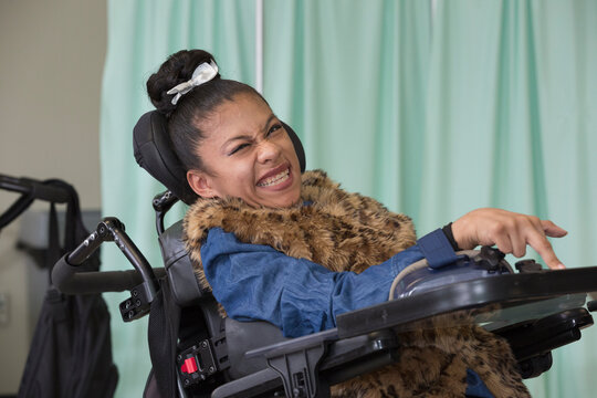 Teen with Spastic Dystonic Cerebral Palsy at school