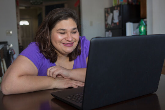Girl with Cerebral Palsy using her computer