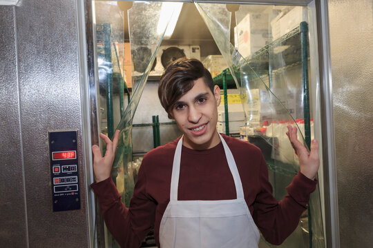Teen with Fragile X Syndrome working in a restaurant
