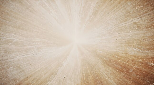 A bright light shines radiantly from the center of a textured brown surface.