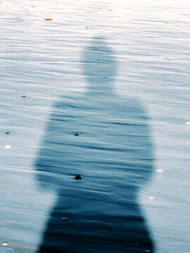 sillouette reflection in the water