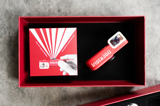 Bangkok, Thailand - June 8, 2026 : Open box of Insta360 GO 3S Retro Bundle. Special edition in a bold Classic Red finish.