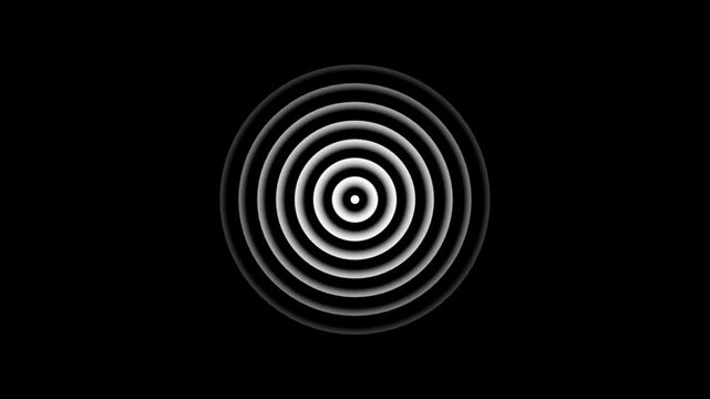 Concentric circles of light and shadow creating a ripple or wave effect on a stark black background.4k video
