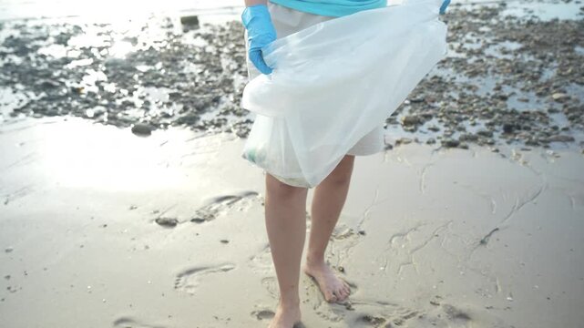 Save ocean. Volunteer pick up trash garbage at the beach and plastic bottles are difficult decompose prevent harm aquatic life. Earth, Environment, Greening planet, reduce global warming, Save world