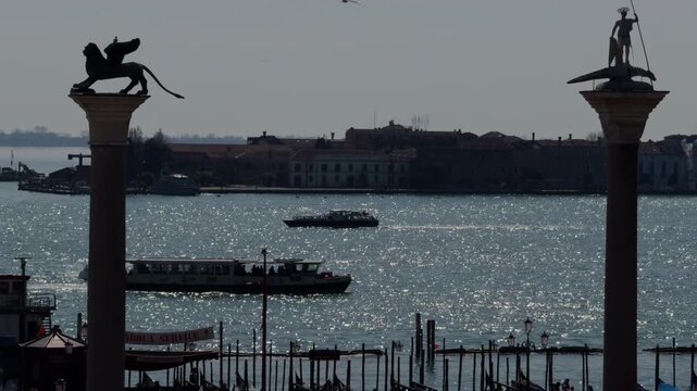 Slow Motion Boats Crossing Venice Canal Between Historic Columns