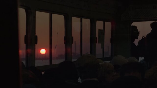 Slow motion sunset commute inside coastal vaporetto