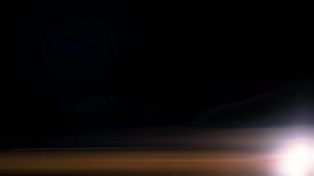 Artistic light leak transition delivering bright illumination and fluid light motion for engaging content.
