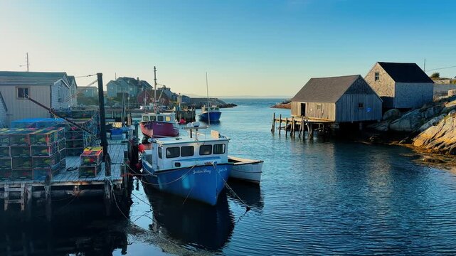 Explore Peggy's Cove harbor in Nova Scotia with fishing boats and colorful traps at sunset