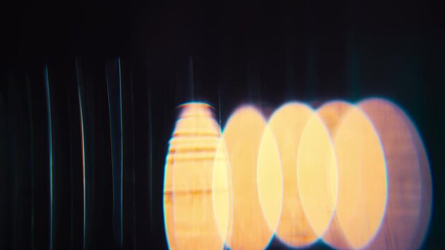 Cinematic Light Leak Overlay with Glowing Bokeh, lens artifacts, chromatic aberration, and subtle film imperfections. Ideal for cinematic overlays, transitions, and retro visual effects.