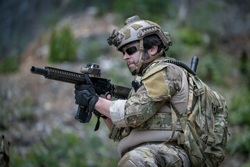 Fototapeta premium Tactical soldier in action with advanced weaponry and gear