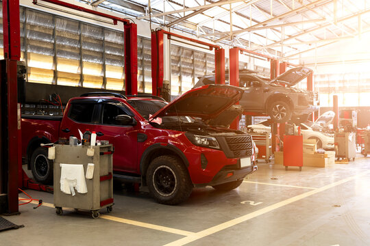 Vehicles Under Maintenance in Professional Auto Repair Service Center