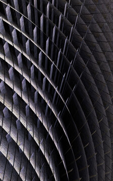 Detalle de superficie arquitect&oacute;nica abstracta con patr&oacute;n geom&eacute;trico de rombos oscuros. Superficie negra texturizada con patr&oacute;n geom&eacute;trico de rombos repetitivo. Detalle de arquitectura moderna, fondo 