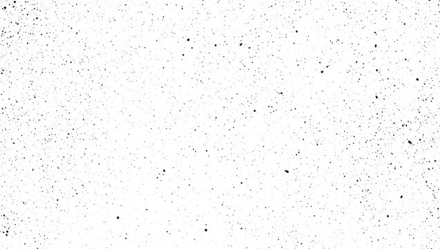 Black particles on white background
